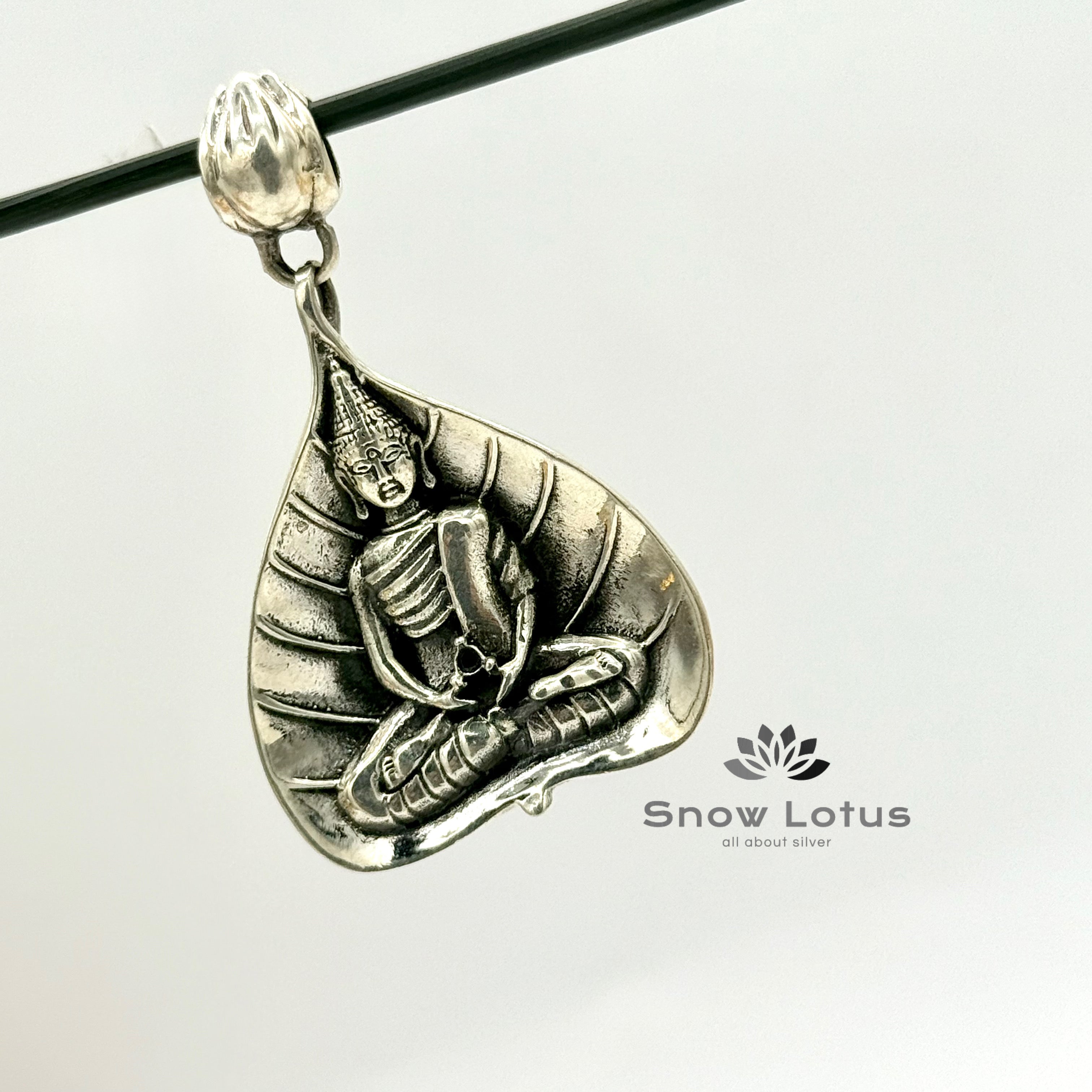 Buddha On Bodhi Leaf Pendant
