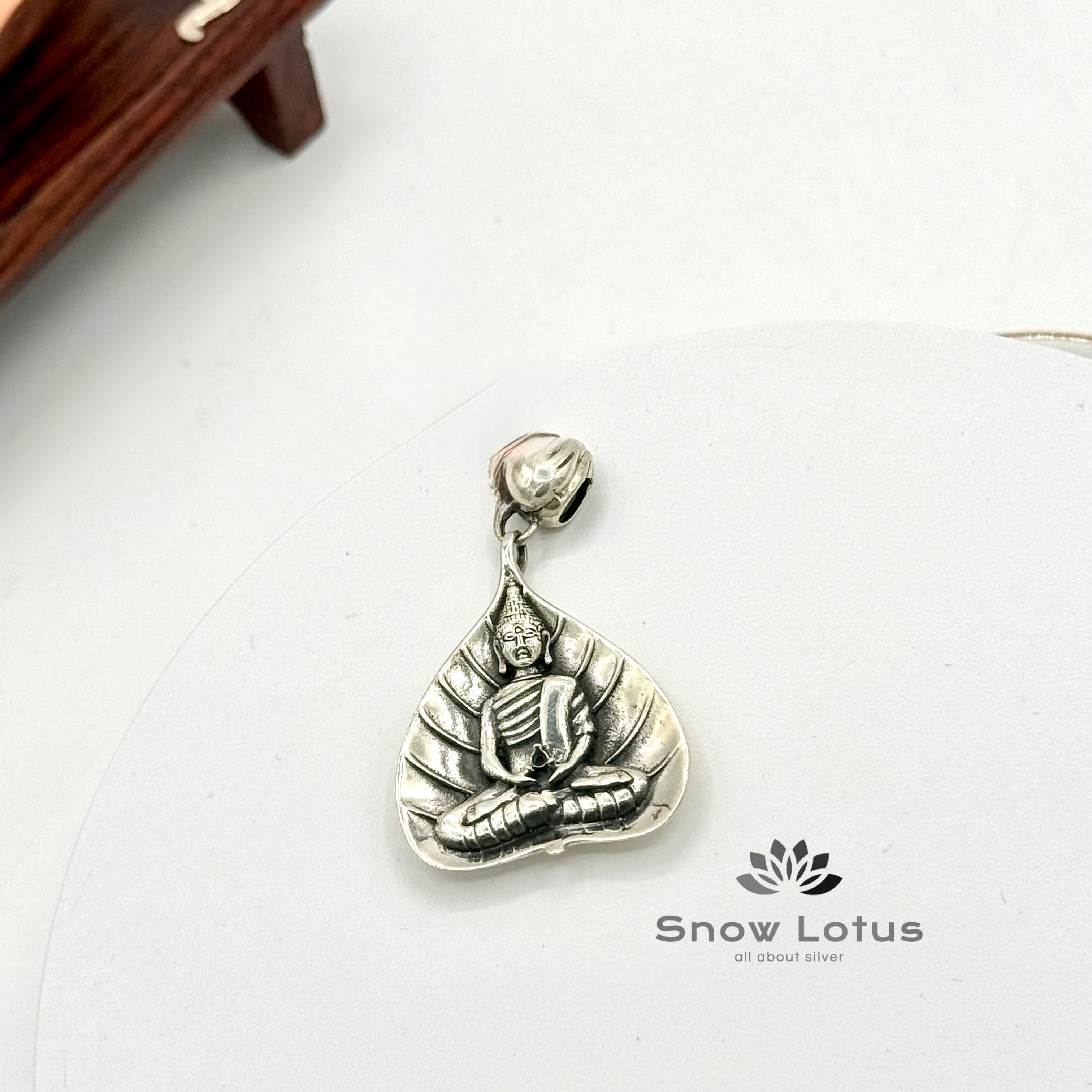 Buddha On Bodhi Leaf Pendant