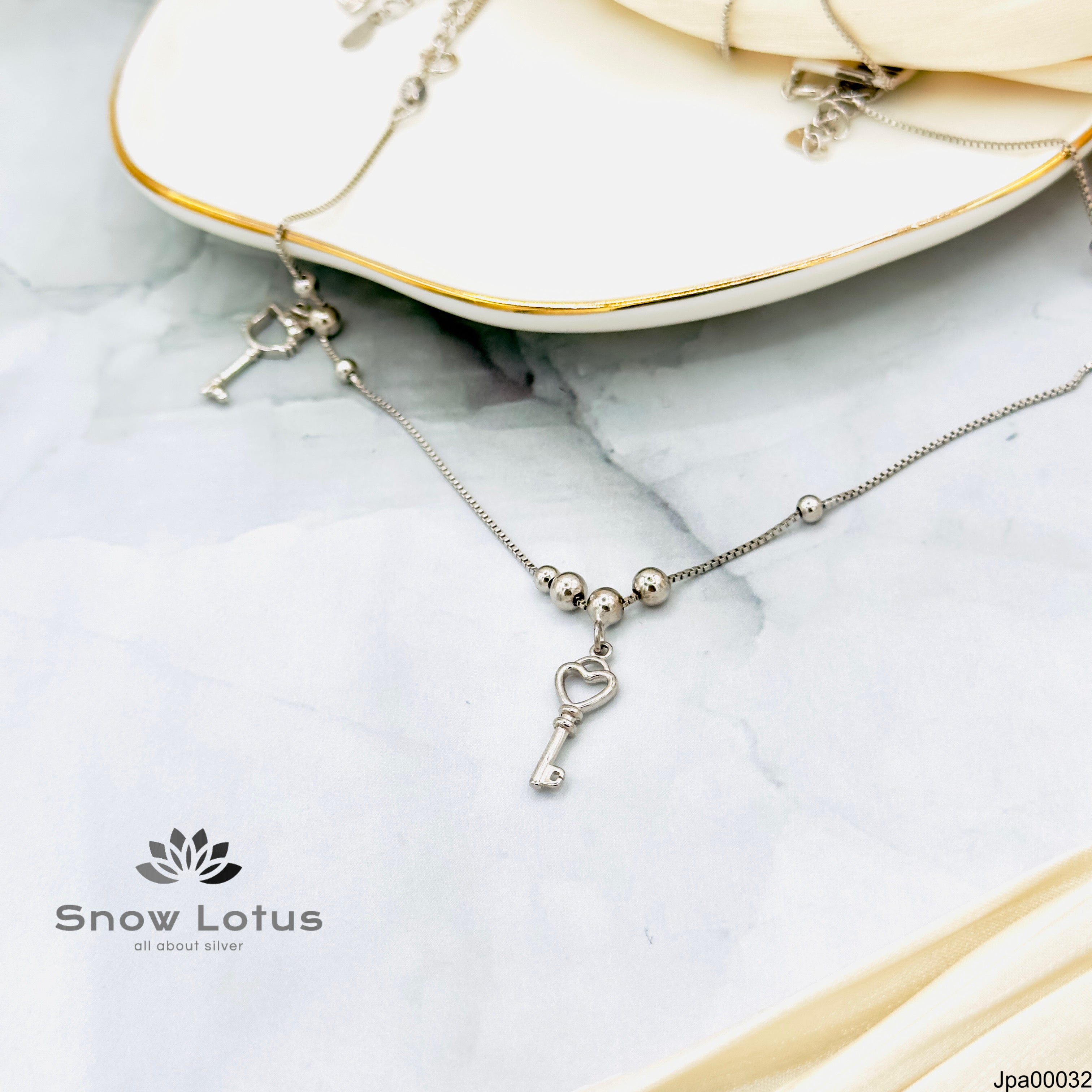 10.0 Plan charms Payal pair Key