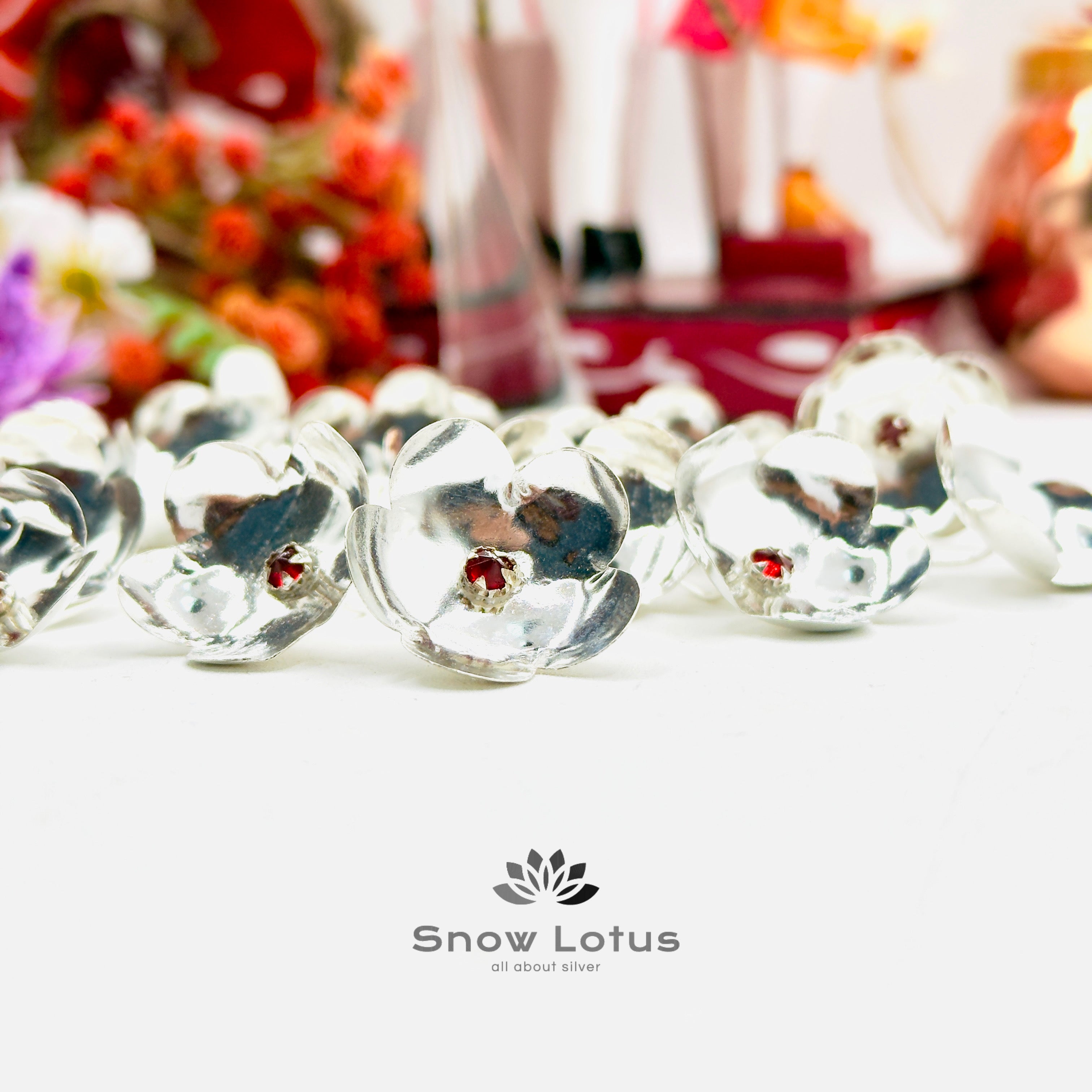 108 Silver Flowers with Red Stone
