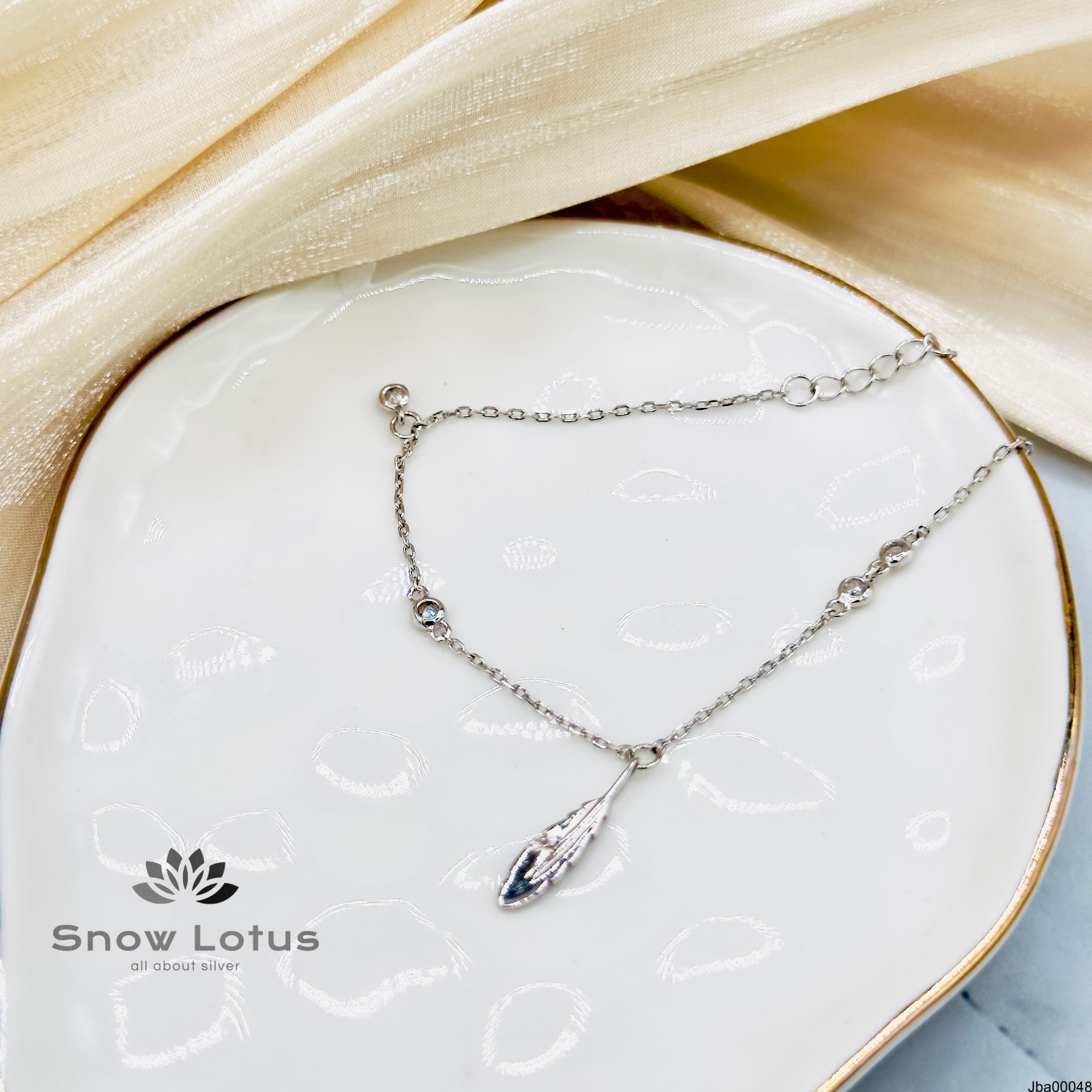 Bracelet feather charm