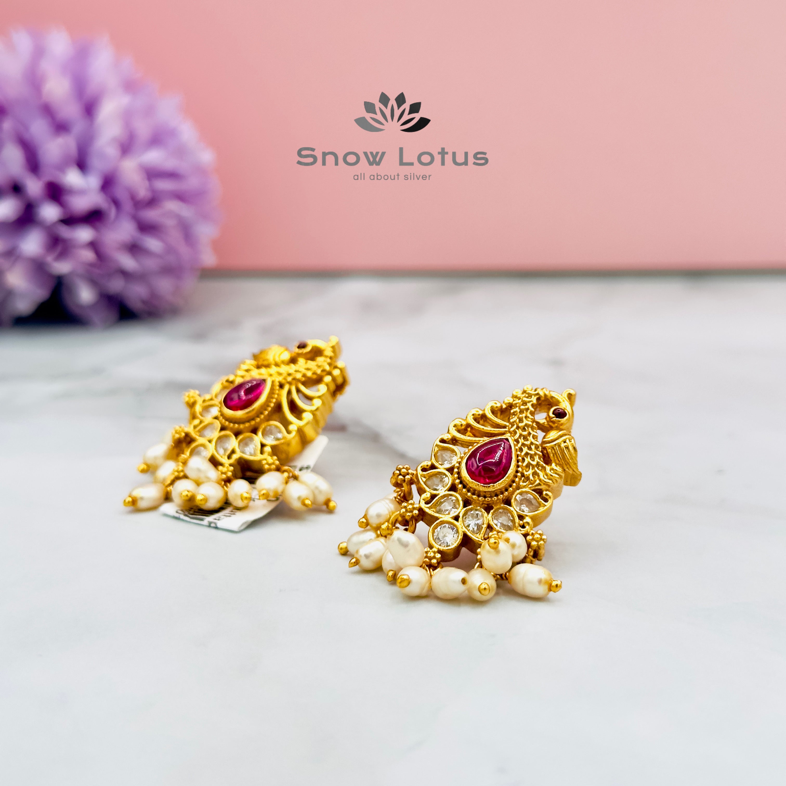 Peacock guttapusalu studs