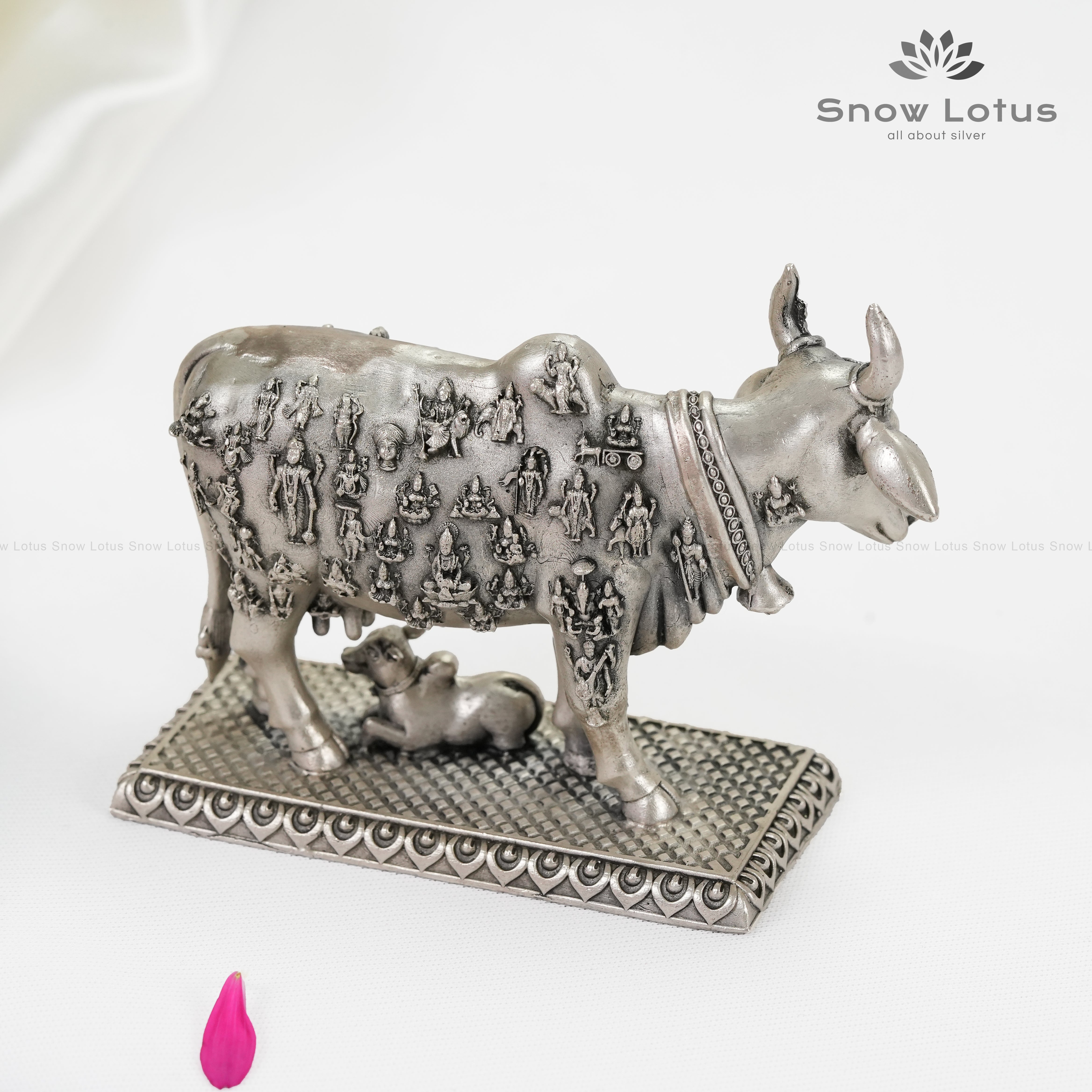 Cow and Calf with Gods Engaved